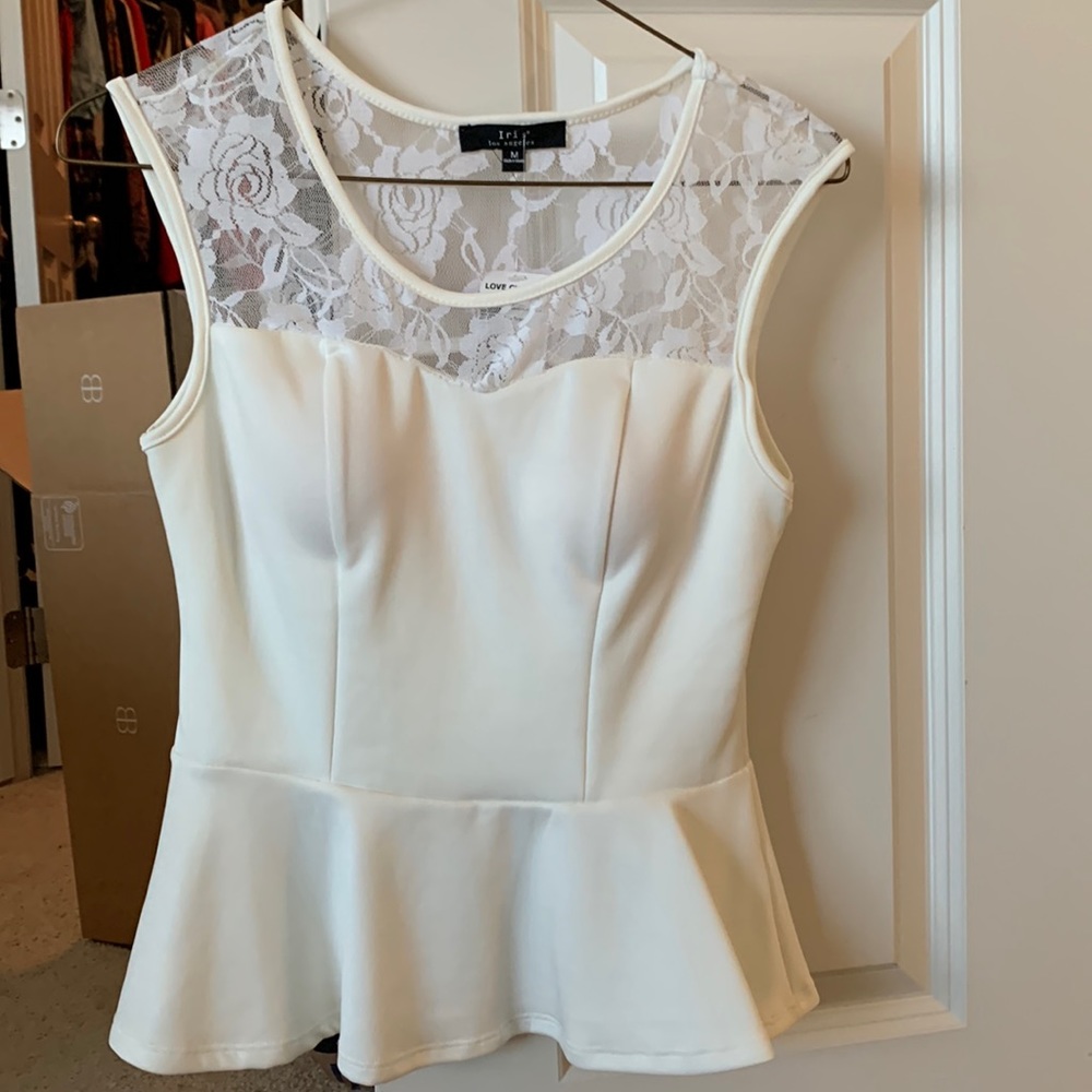 Sleeveless peplum love culture white top